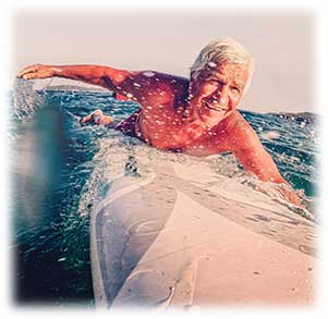 A 100 year old man surfing